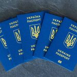 ukraine-passports-stacked-ukrainian-biometric-passport-emigration-concept